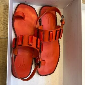 Tomas Maier Vibrant Red Gladiator Sandals with Buckle and Jeweled Detail - 6.5